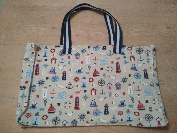 SAC DE JOUET-PLAGE "mini phares bleu et rouge"